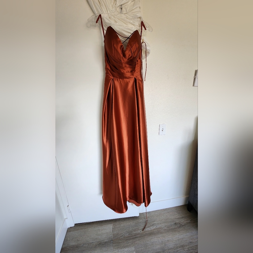 Beautiful silk, cinnamon color wedding dress. Never worn, not needed anymore.